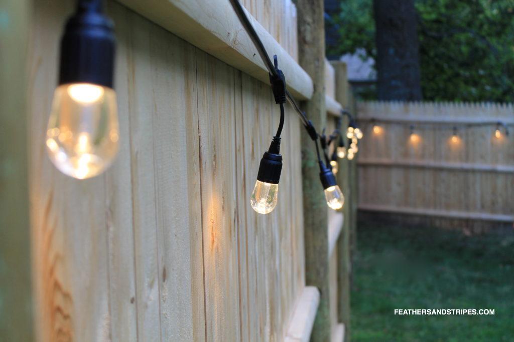 backyard cafe lights featured by top Boston lifestyle blog, Feathers and Stripes