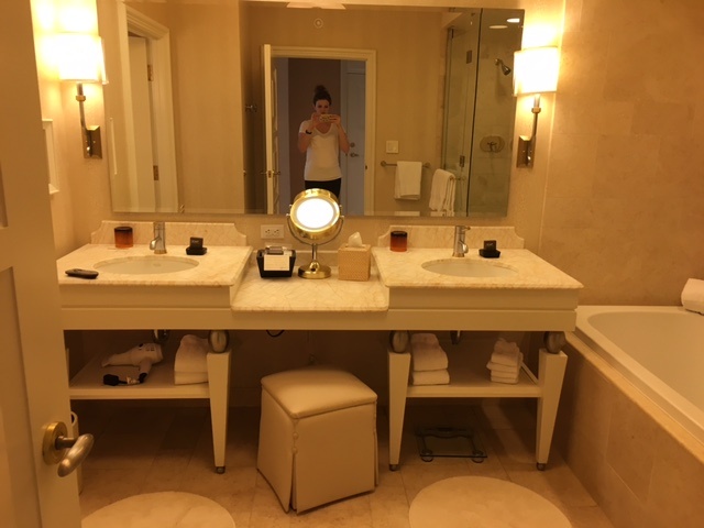 Wynn hotel Las Vegas bathroom vanity featured by top Boston travel blog, Feathers and Stripes