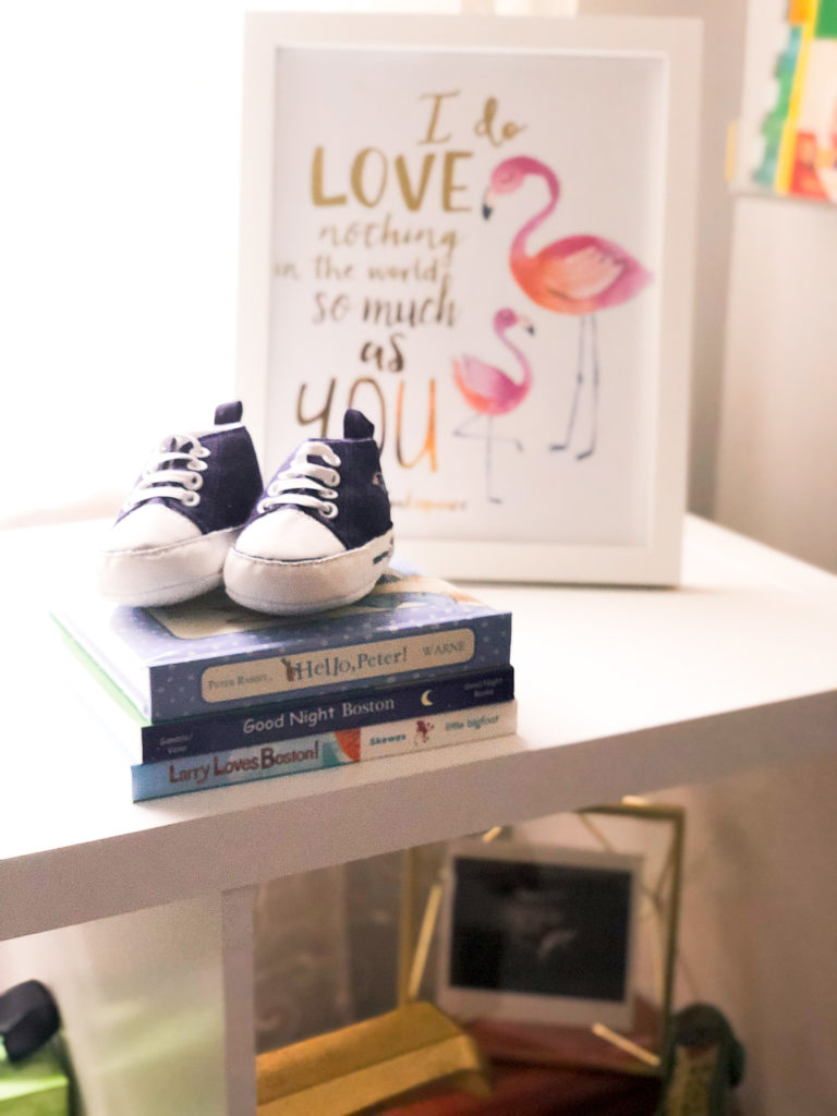 pink and gray baby girl nursery, small space nursery | Pink and Gray Nursery decor ideas featured by popular Boston life and style blogger, Feathers and Stripes