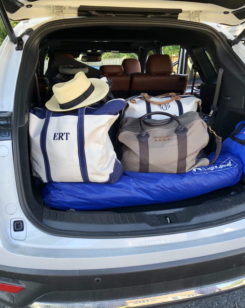 monogrammed travel bags for her, him, and baby