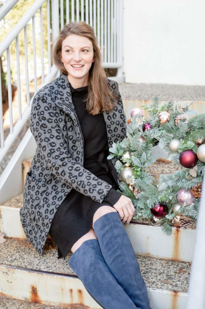 How to wear a black sweater dress with OTK boots - comfy and classic for a holiday get-together