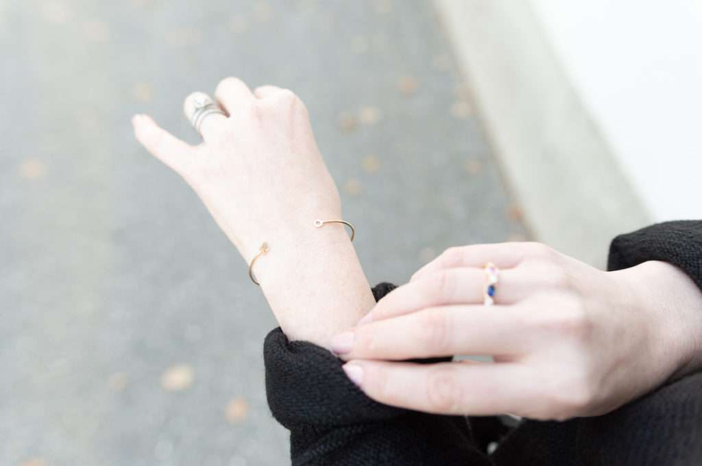 How to wear a black sweater dress with OTK boots - comfy and classic for a holiday get-together