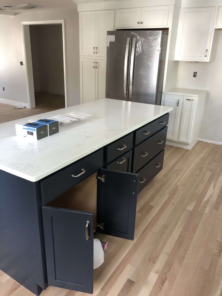 white and navy blue kitchen renovation